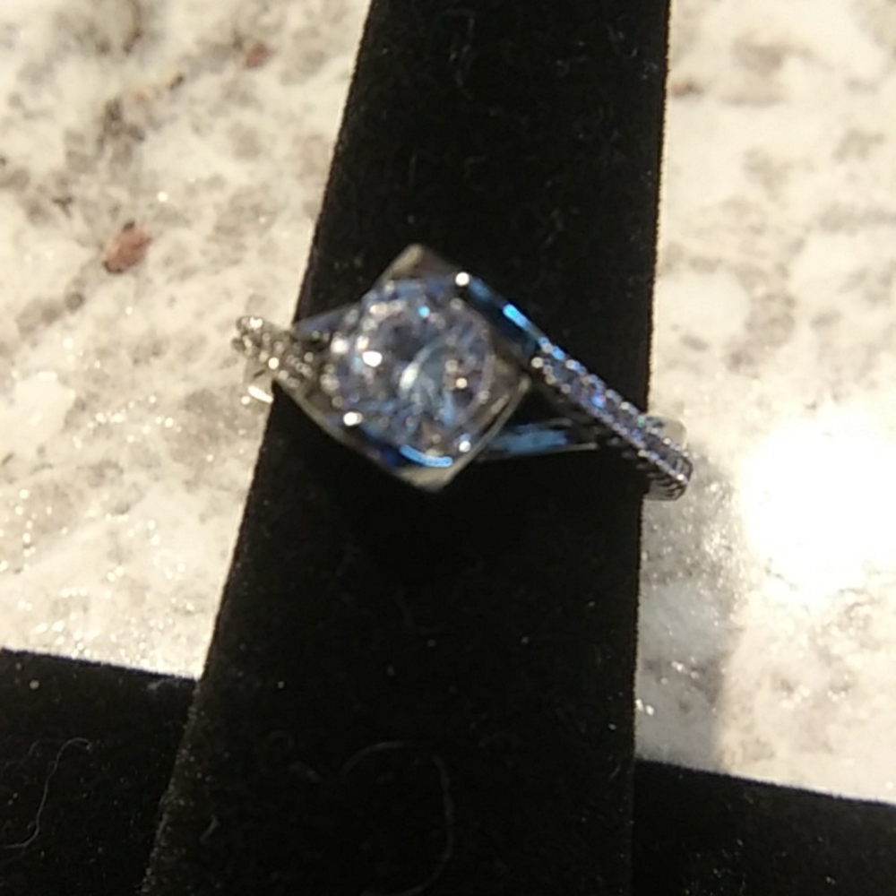 1.05 CT Moissanite .925 silver Adjustable ring.